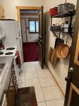 Kitchen with clever extra storage space and all new service and prep items.
